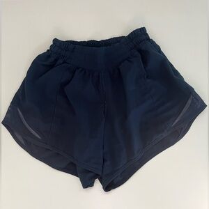 Lululemon: Navy Hotty Hot shorts 
Size 4 Length 2.5